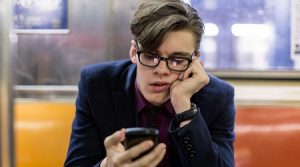 Man Bored on Phone